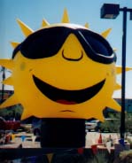 Sun advertising inflatables - giant balloons made in the USA.